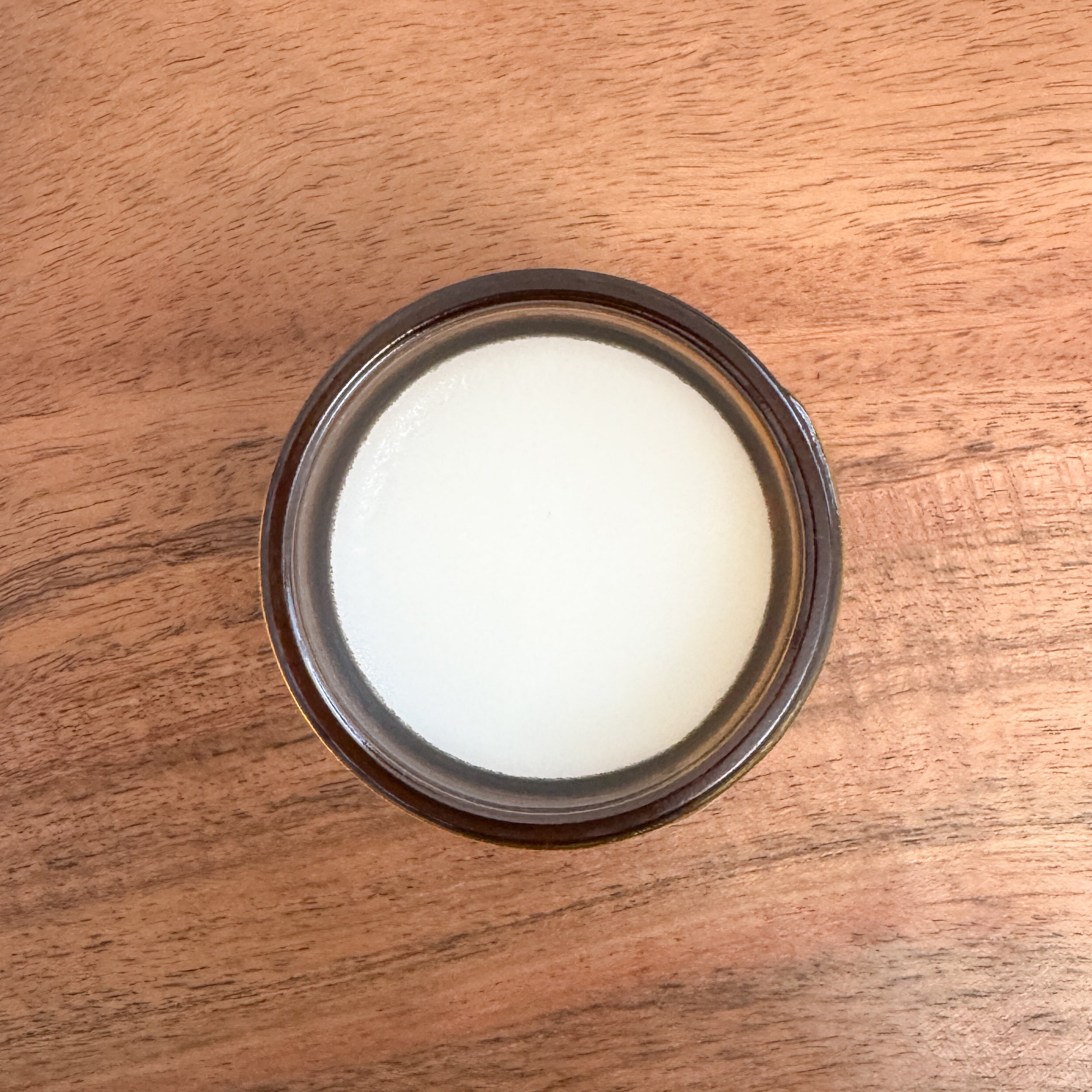 Ancient Alleviate muscle relief balm in amber glass jar by Sofia Tallow Co